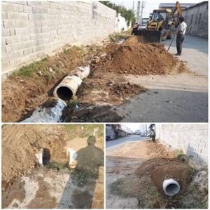 نصب لوله سیمانی هدایت آبهای سطحی شهرک مسکن مهر پشت سپاه ناحیه شهرستان